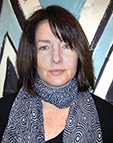 A headshot of Megan Sexton, Editor.